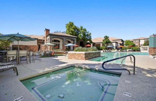 Glendale Sports and Entertainment District Apartment | Champion's CozySuite walk to the stadium with pool!