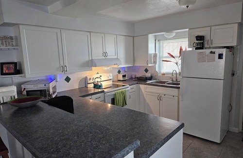 Titusville Condo | Charming 2-bedroom condo in delightful Titusville wth WiFi AC, pool laundry room