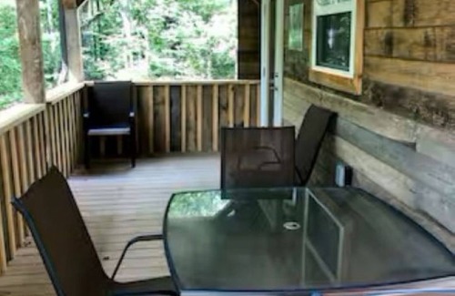 Walland Cabin | Charming 2-bedroom cabin with hot tub, outdoor firepit and Pet Friendly!