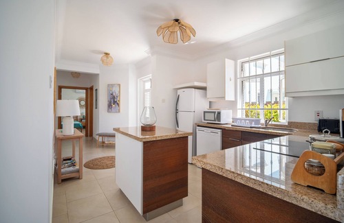 Enterprise Condo | Charming 2-bedroom Condo Near White Sandy Beaches and Surf Breaks
