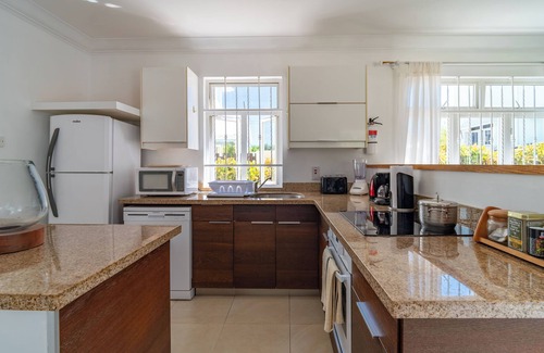 Enterprise Condo | Charming 2-bedroom Condo Near White Sandy Beaches and Surf Breaks