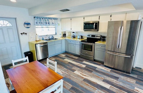 Matlacha House | Charming 2-bedroom waterfront townhome with WiFi, AC Hot Tub and dock