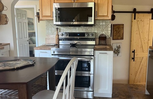Shore Acres House | Charming 2BR house with a Swimming Pool and a Garden.