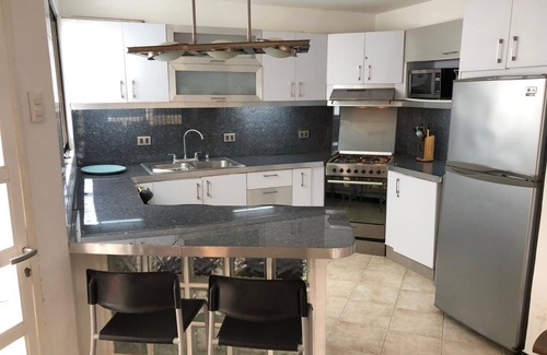 Tucacas House | Charming 3-bedroom beach front house with WiFi and AC in Tucacas