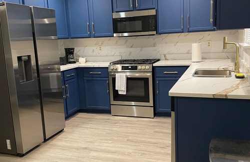 Charlotte House | Charming 3-bedroom house with WiFi, AC in serene Charlotte.