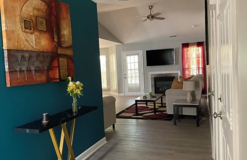Charlotte House | Charming 3-bedroom house with WiFi, AC in serene Charlotte.