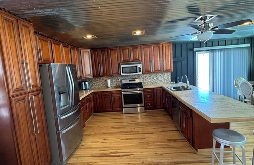 Webster House | Charming 3-bedroom Lake House with dock, hot tub, AC in delightful Waterville