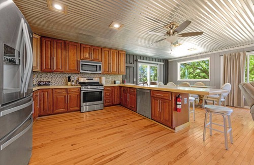 Webster House | Charming 3-bedroom Lake House with dock, hot tub, AC in delightful Waterville