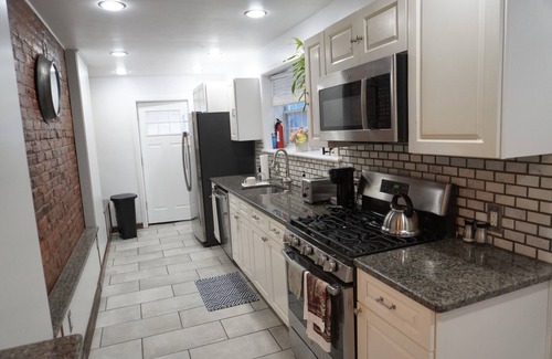 St. Paul's Park House | Charming 3-bedroom townhome with AC, Fiber optics WIFI, & Dedicated Work Space.