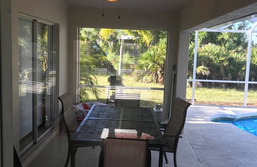 Long Meadow House | Charming 3-bedroom house with heated pool WiFi and AC in serene Rotonda West