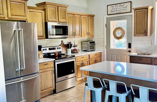 Eldon Other | Charming 4-bedroom farmhouse in Eldon with pool, hot tub & firepit!