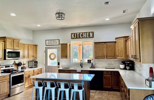 Eldon Other | Charming 4-bedroom farmhouse in Eldon with pool, hot tub & firepit!