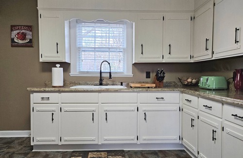 Olivia House | Charming 4-bedroom historic estate with beautiful pond views in Sanford