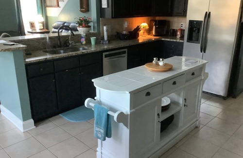Evans House | Charming 4 bedroom two story home in a golf course neighborhood.