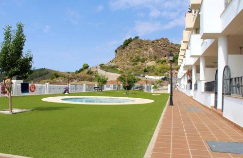 Almeria Apartment | Charming apartment in Enix, Almería with shared pool
