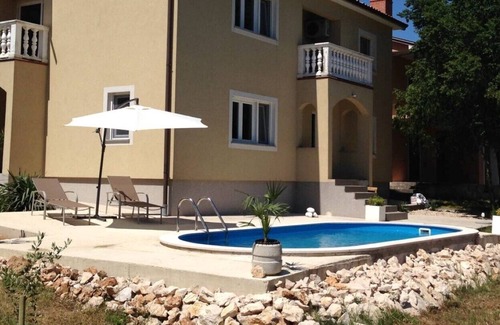 Plomin Apartment | Charming apartment with pool near sea