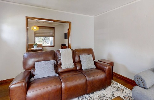 Murray Hill House | Charming brick abode with enclosed yard, grill, children's games, & AC - dogs ok