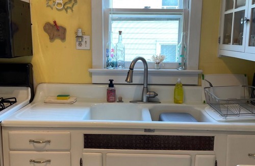 Titusville House | Charming bungalow in historic Titusville with screened in porch.