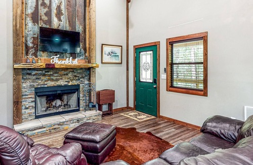 Waller Cabin | Charming cabin with hot tub, full kitchen, firepit, deck, grill, & W/D