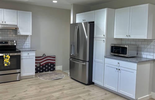 Coloma Cottage | Charming Cape Cod House Minutes From Paw Paw Lake, Wineries, and Wedding Venues