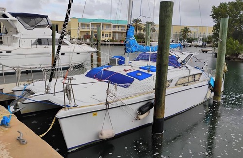 Key West Boat Rental | Charming catamaran sailboat with AC, pool in stock island yacht club, Key West.