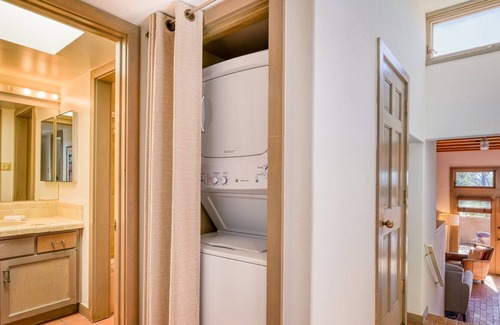 Nambe Pueblo Apartment | Charming condo with fireplace, patio, grill, W/D, & pool - quiet location