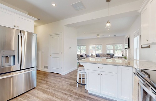 Arundel Cottage | Charming cottage on a preserve with fireplace, WiFi, W/D, pool, gym, & game room