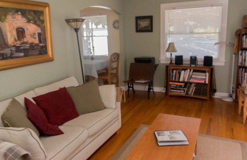 North Park Cottage | Charming Cottage W/ Garden is Idyllic Retreat in Urban Setting