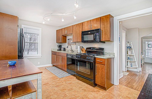 New Buffalo Cottage | Charming cottage with fast WiFi, fire pit, above-ground pool, & huge sunroom