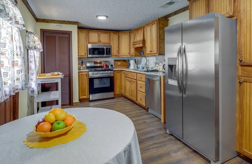 Covington House | Charming Covington Retreat w/ Yard & Sunroom!