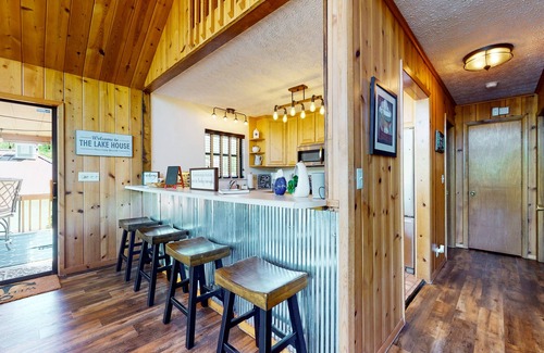 Big Creek House | Charming dog-friendly lakefront home w/dock, firepit, huge deck