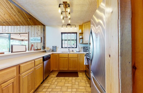 Big Creek House | Charming dog-friendly lakefront home w/dock, firepit, huge deck