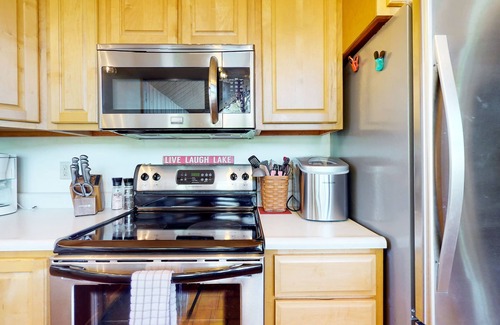 Big Creek House | Charming dog-friendly lakefront home w/dock, firepit, huge deck