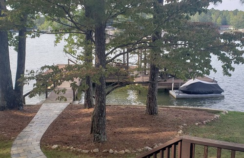 Little Kowaliga Cabin | Charming family-friendly Lake Martin 4-bedroom/4-bath cabin beautiful on point.