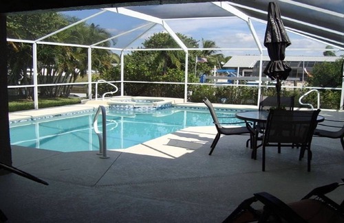 Fort Myers House | Charming Gulf-Access Waterfront Home with Private Dock & Heated Pool/Spa.