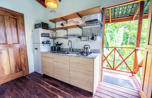 Isla Bastimentos House | Charming Hilltop Jungle Bungalow of Isle Bastimentos with WiFi & AC
