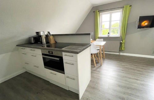 Ockholm Apartment | Charming Holiday Apartment in Reetdachhaus Bongsiel, Ockholm