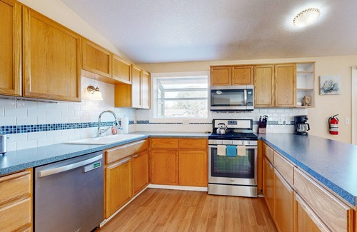 Warrenton House | Charming home near ocean with patio, firepit, WiFi, streaming, and wood stove