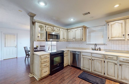 Conway House | Charming home with indoor fireplace, outdoor firepit, and private washer/dryer
