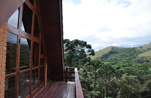 Campos do Jordao Cottage | charming house in the midst of Campos do Jordao Mountains with tennis court.