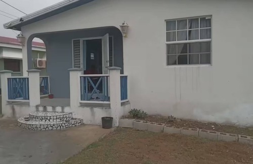 Ruby House | Charming house in terrific Long Bay with AC, WiFi