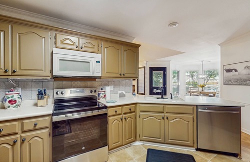 Conway House | Charming House with Cozy Fireplace, Patio, and Washer & Dryer