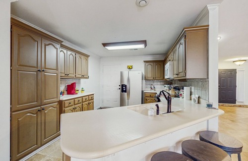 Conway House | Charming House with Cozy Fireplace, Patio, and Washer & Dryer
