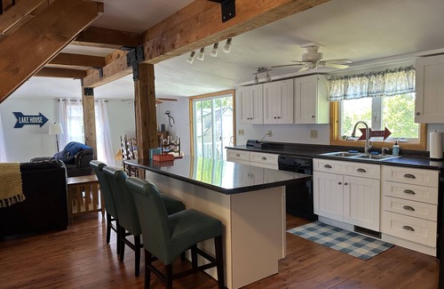 Deerfield Cottage | Charming lakeside cottage steps away from private sandy beach. Summer weeks open