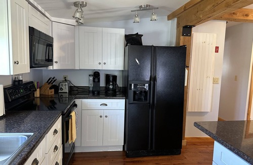 Deerfield Cottage | Charming lakeside cottage steps away from private sandy beach. Summer weeks open