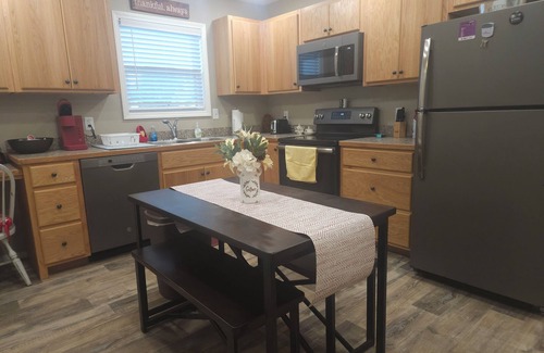 Mena House | Charming little home located in the heart of Mena.