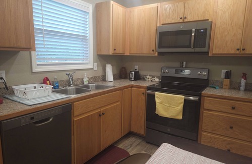 Mena House | Charming little home located in the heart of Mena.