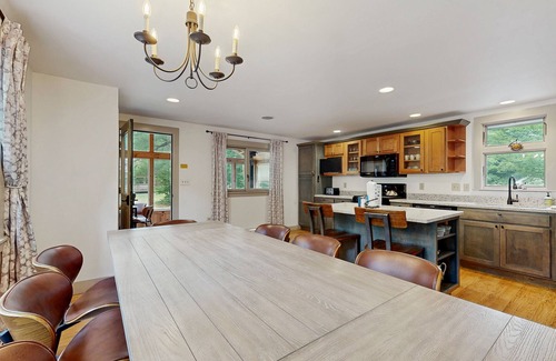 Sunday River Area Ski Chalet | Charming mountain chalet with a hot tub, fire pit, and room for the whole family