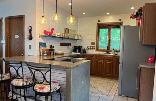 Ellicottville House | Charming Pink Chalet near Holiday Valley | Ski, Shop, Relax & Unwind