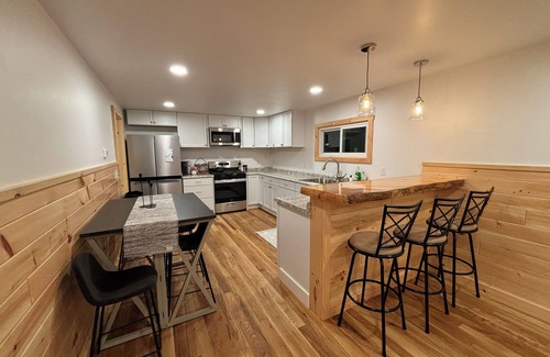 Boyne Falls Cabin | Charming Red Cabin in the woods. A perfect stay just 3 min from ski resort! n